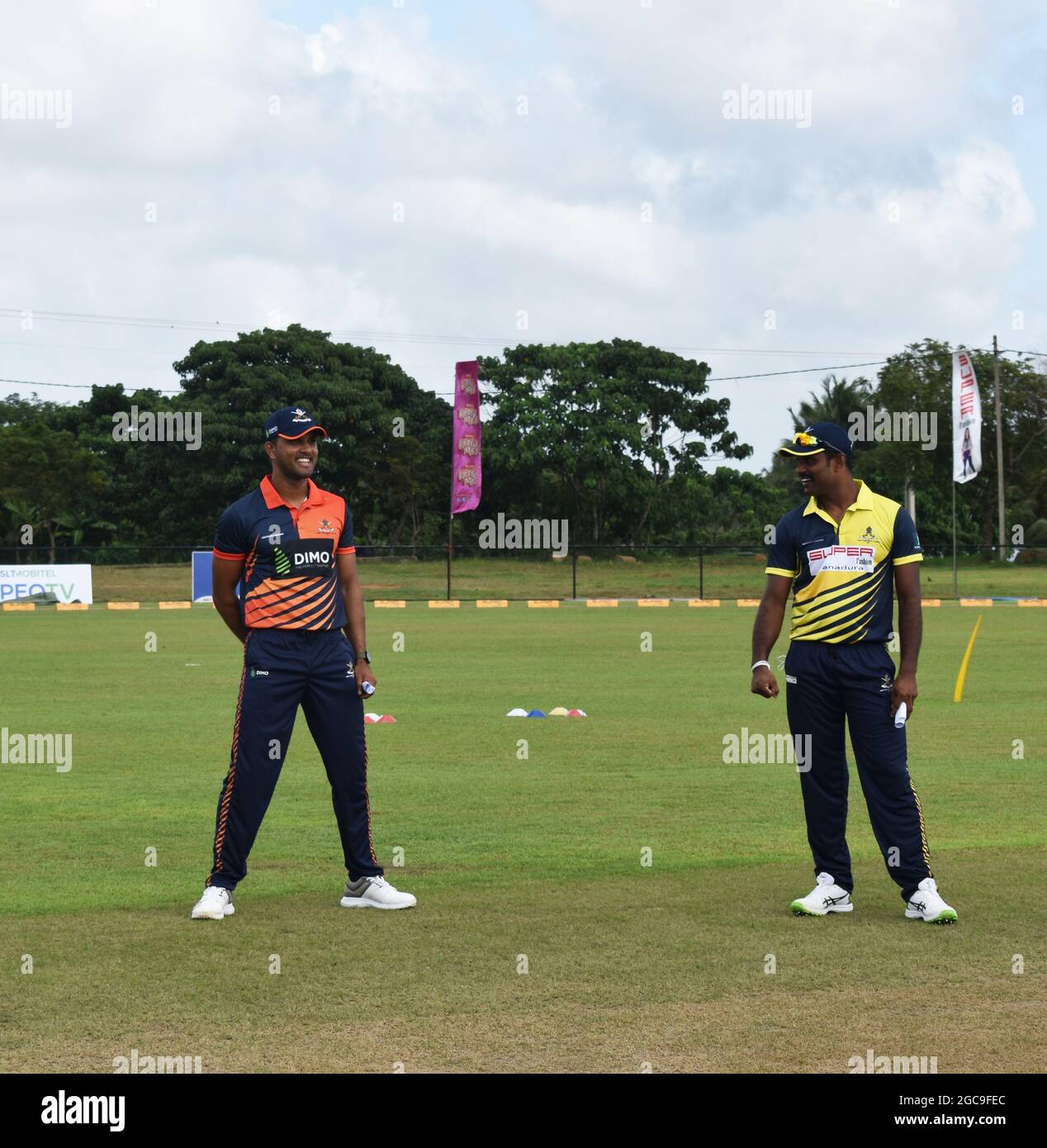 Sri Lanka cricketers Dinesh Chandimal and Seekuge Prasanna at the toss for a match. At the picturesque Army Ordinance cricket grounds. Dombagoda. Sri Lanka. Stock Photo