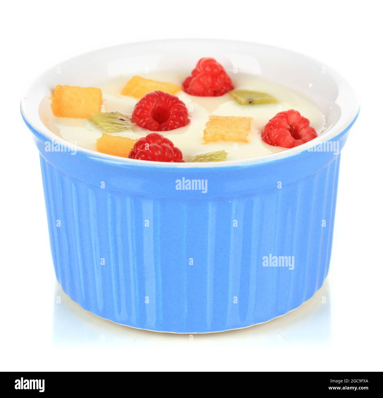 Delicious yogurt with fruit isolated on white Stock Photo Alamy