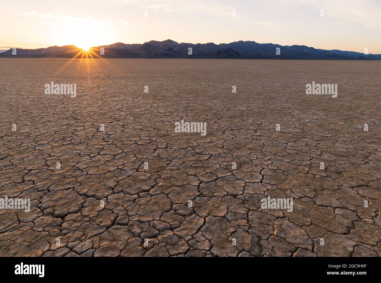 Sunrise over the cracked earth of the playa in the Black Rock Desert, Nevada. Stock Photo