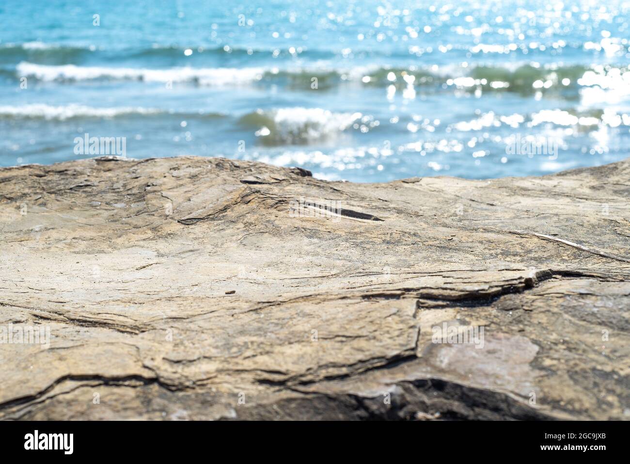 Empty cliff stone with summer blue sea blur background. Copy space for display of product on online media Stock Photo