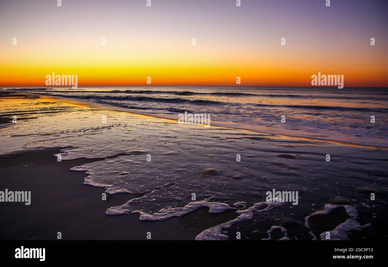 Dawn breaks on the beach at Isle of Palms, South Carolina Stock Photo