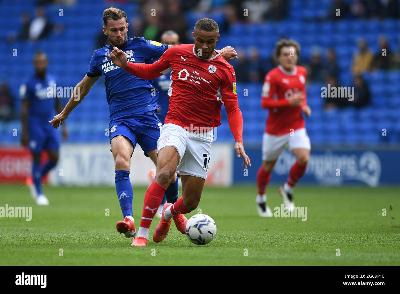 Cardiff, UK. 07th Aug, 2021. Marlon Pack #21 of Cardiff City under pressure  from Callum Styles #4 of Barnsley in Cardiff, United Kingdom on 8/7/2021.  (Photo by Mike Jones/News Images/Sipa USA) Credit