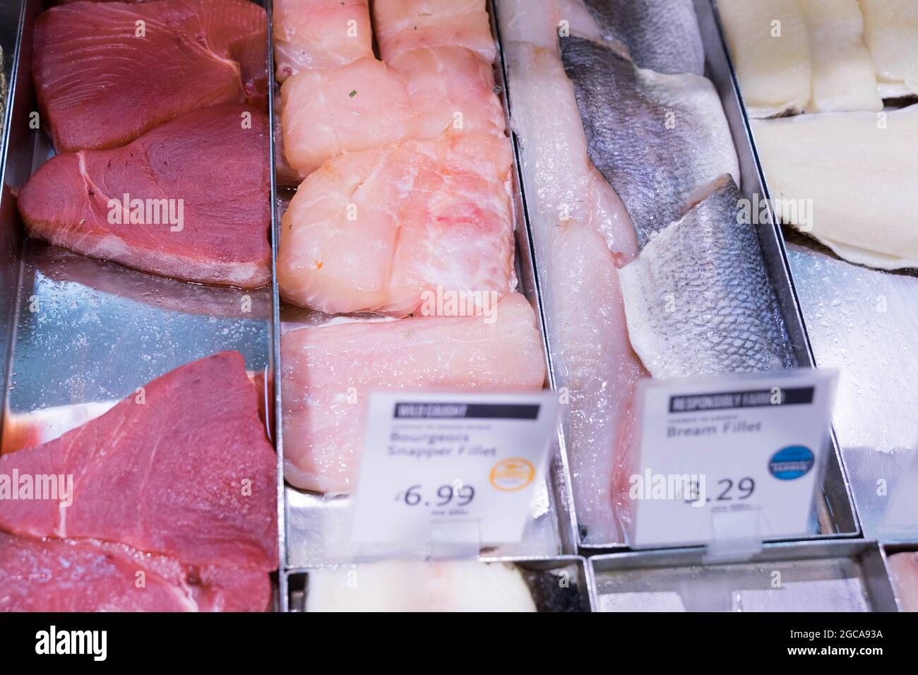 Bream Fillets, tuna steaks  at Whole foods market near Piccadilly circus London England UK Stock Photo