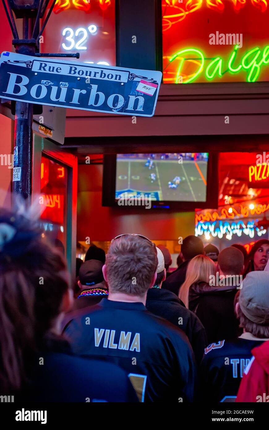 New Orleans Saints fans gather at Big Easy Daiquiris to watch the New Orleans Saints play in the Super Bowl, Feb. 7, 2010, in New Orleans, Louisiana. Stock Photo