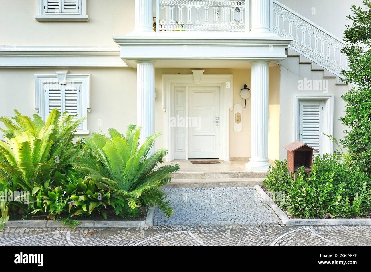 Modern house with landscaping on front Stock Photo - Alamy