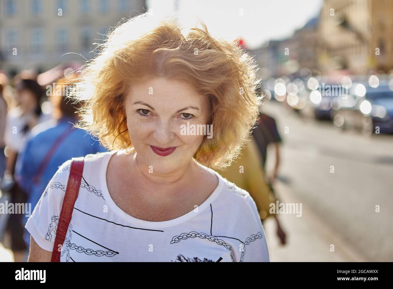 Happy smiling old woman walks hi-res stock photography and images - Alamy