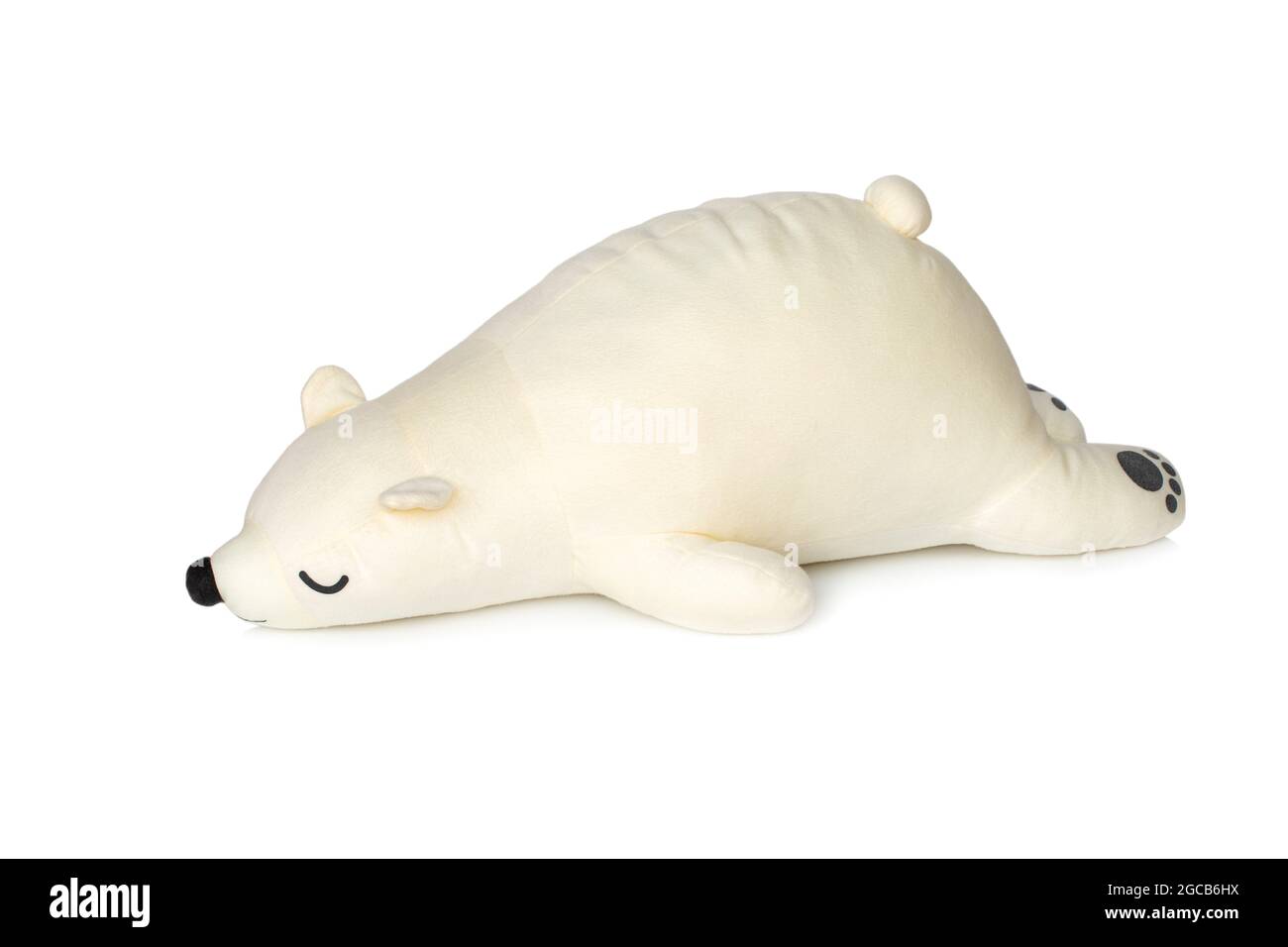 Image of white teddy bear is sleeping isolated on white background. Animal dolls. Stock Photo