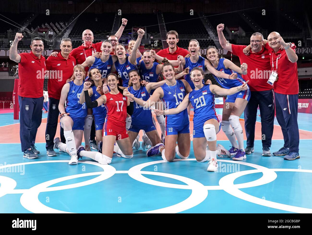 Serbian players celebrate after defeating South Korea in the women's