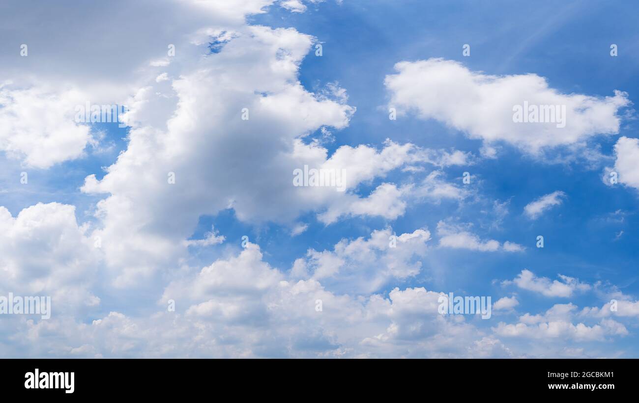 Fluffy white clouds in the blue sky nature background image Stock Photo ...