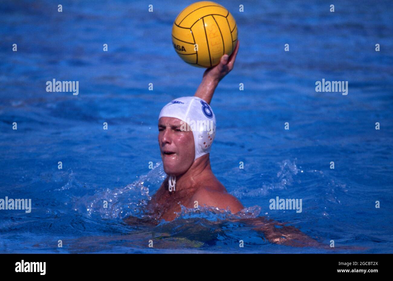 WATER POLO IS A COMPETETIVE TEAM SPORT. SEEN HERE A GAME IN PROGRESS
