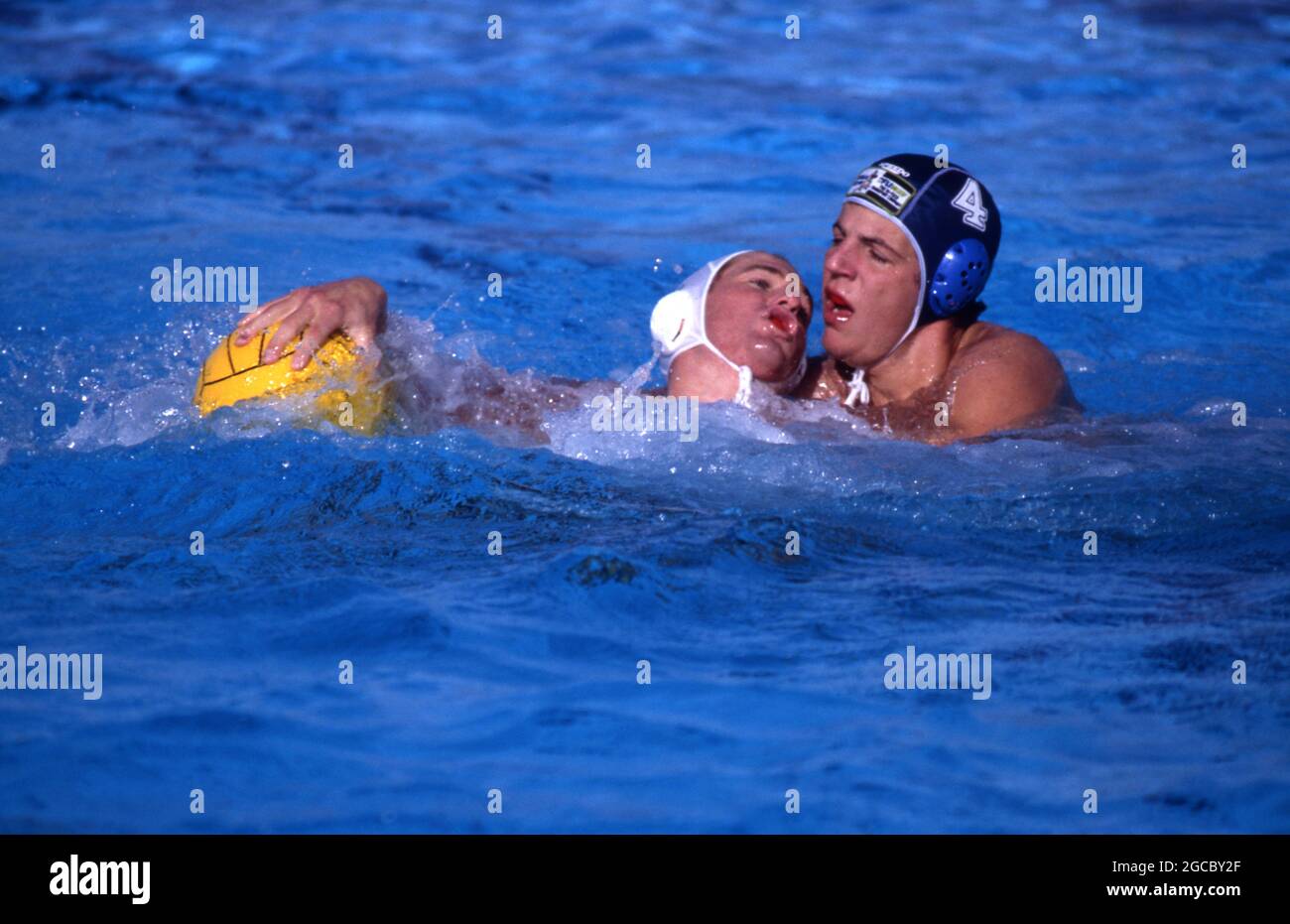 WATER POLO IS A COMPETETIVE TEAM SPORT PLAYED IN WATER. SEEN HERE A