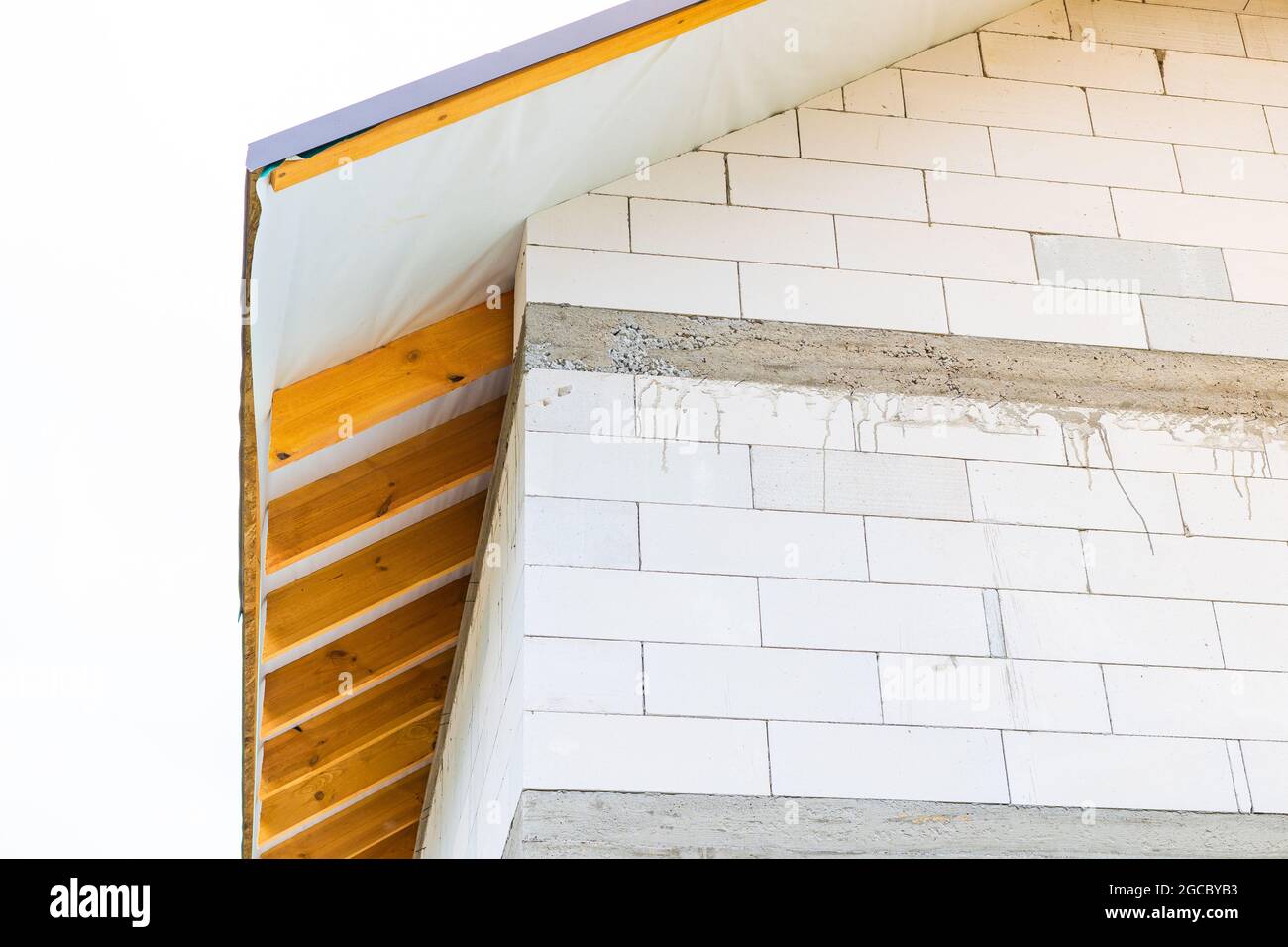 Eaves overhang of the roof of a private house during construction Stock