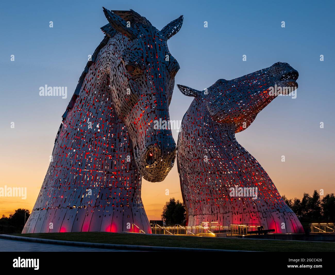 The Kelpies at sunset, Helix Park, Falkirk, Scotland, UK Stock Photo