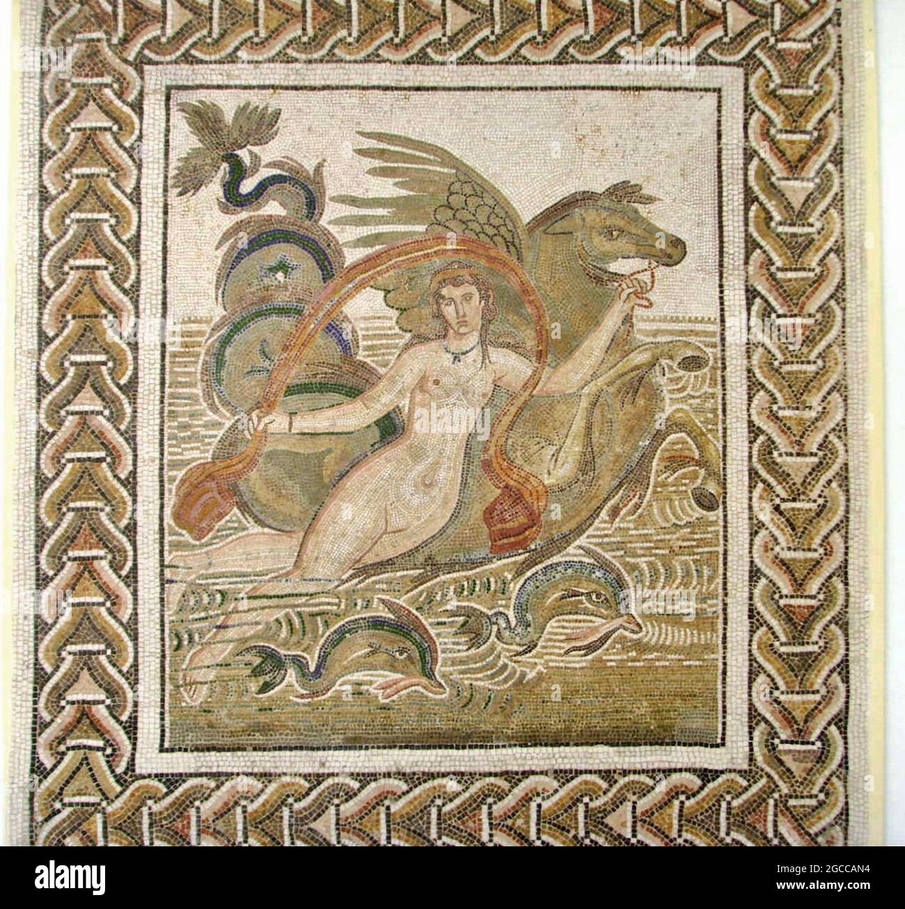 Mosaic Art - El Jem Museum, Tunisia - Nereid, a sea nymph with sea-horse and dolphins Stock Photo