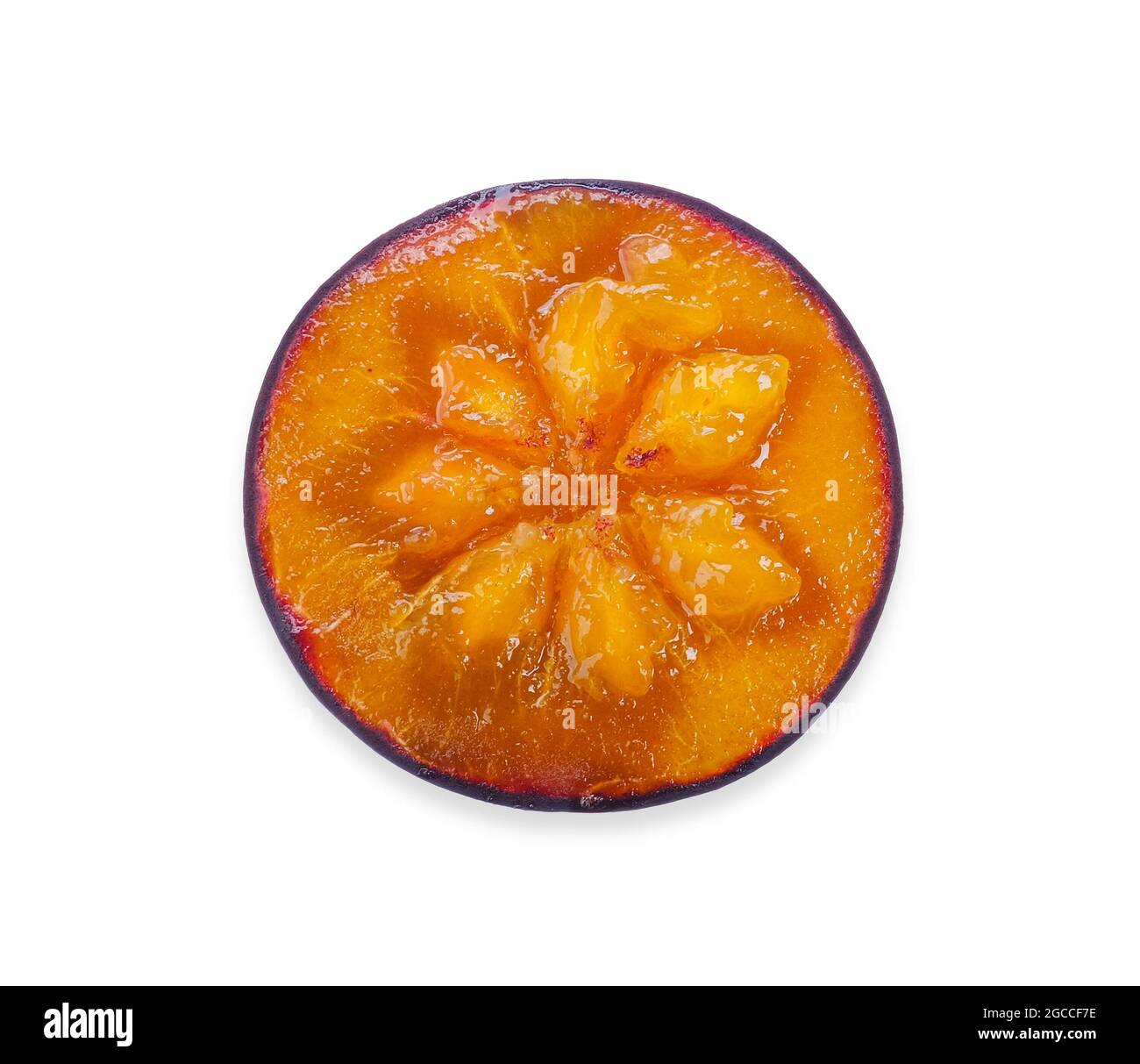 Half of Flacourtia indica fruit isolated on white background. Flacourtia indica clipping path Stock Photo