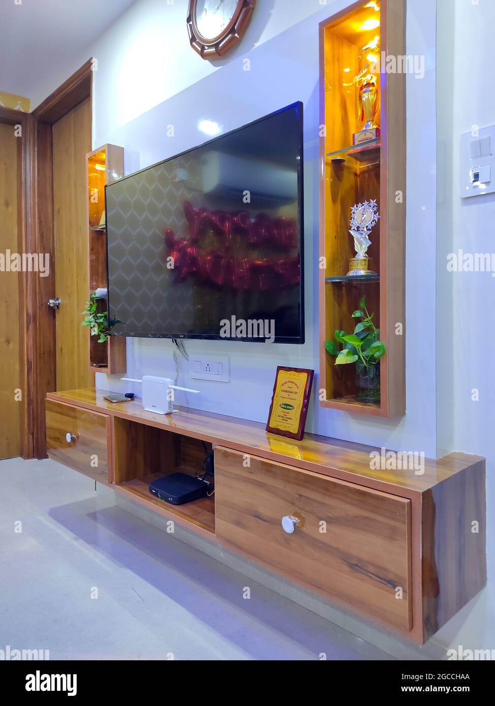 Wall Hanging Television Showcase Cabinet with Wooden Panel, Shelving Racks  display and drawer. Home Interior Stock Photo - Alamy