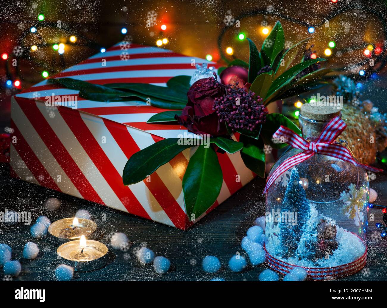 Christmas gift box with christmas decorations and lights Stock Photo