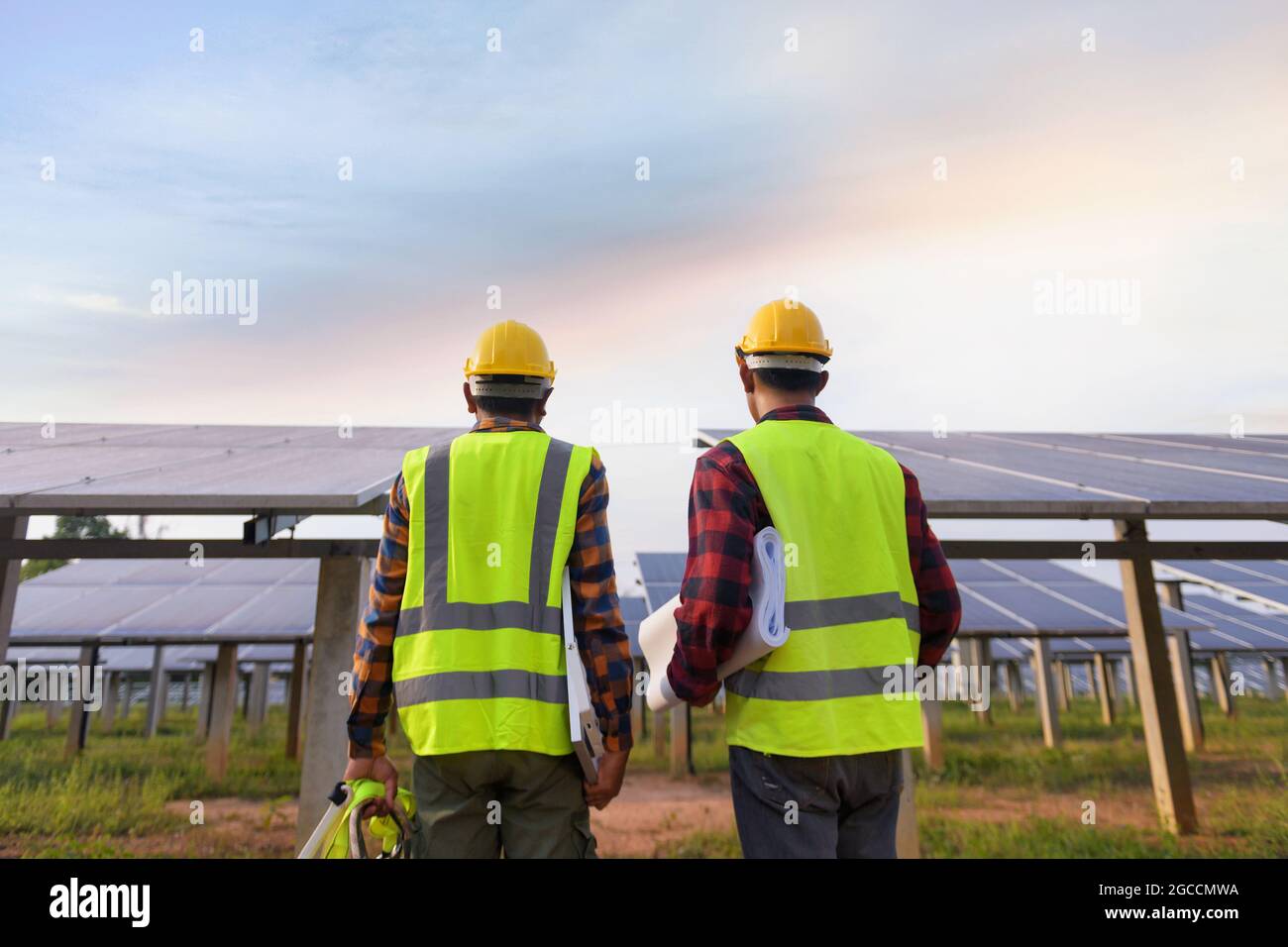 engineer working on checking equipment in solar power plant Stock Photo