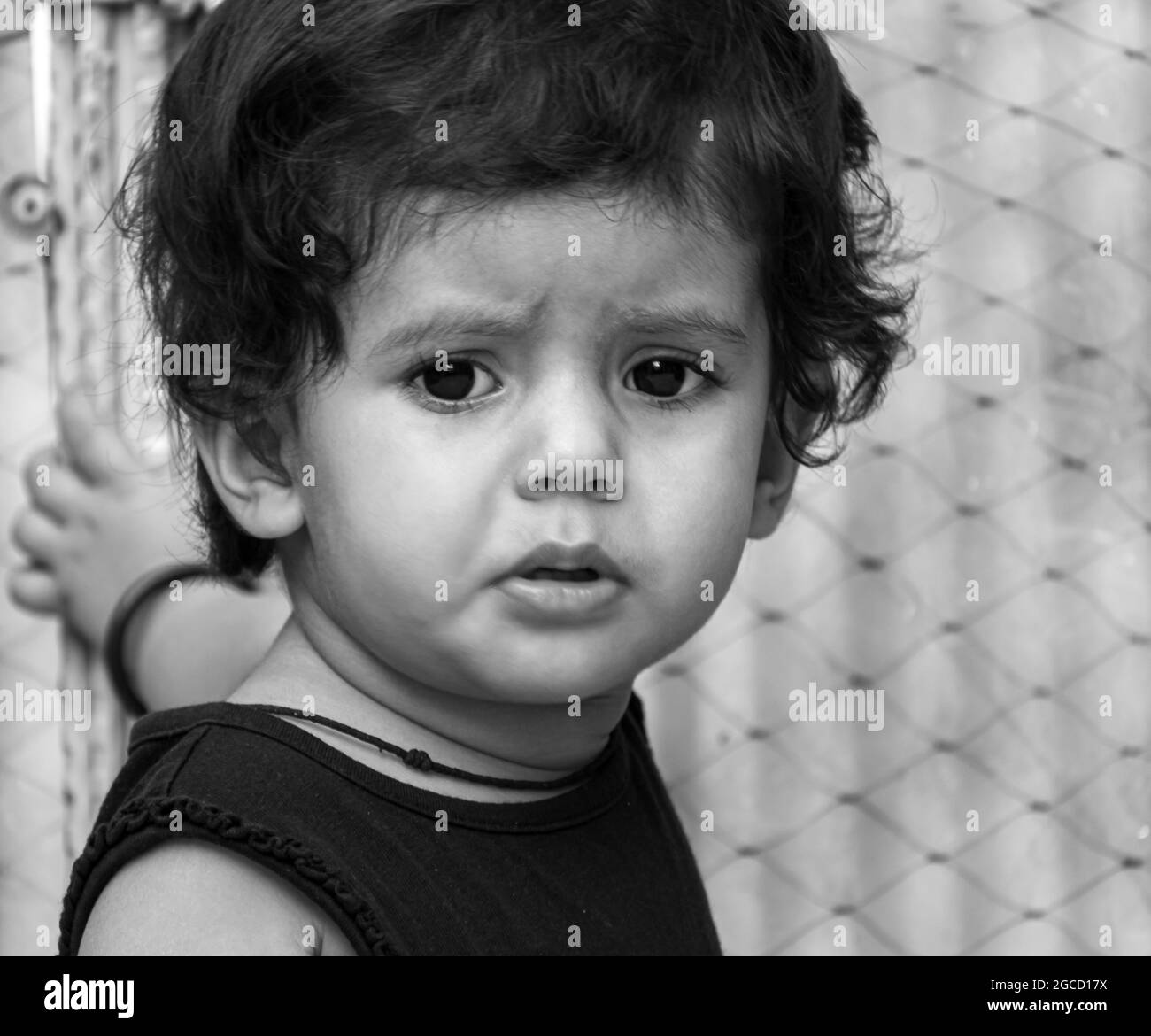 black and white portrait of cute innocent baby. Stock Photo
