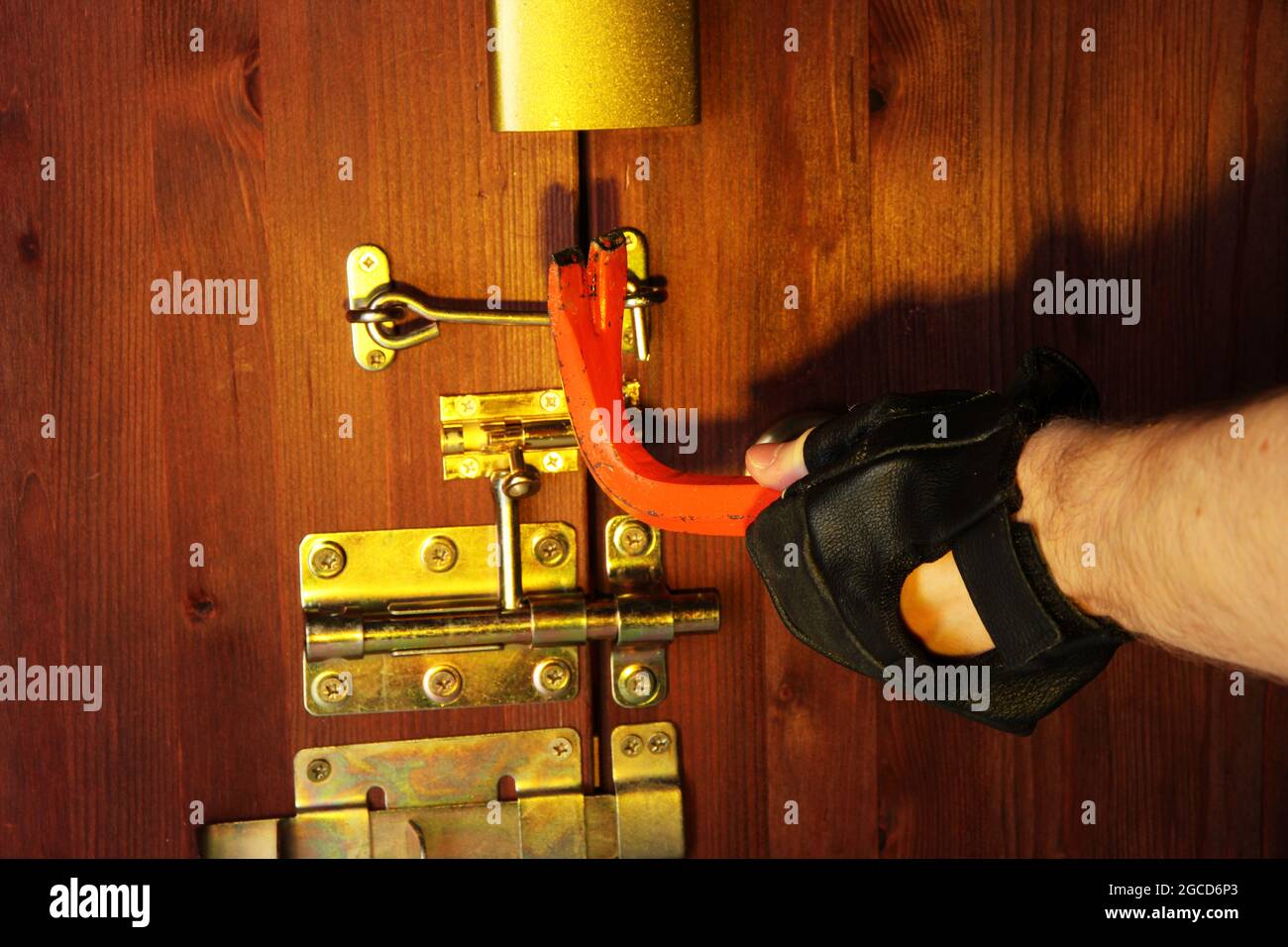 Robber breaks castle in door closeup Stock Photo Alamy