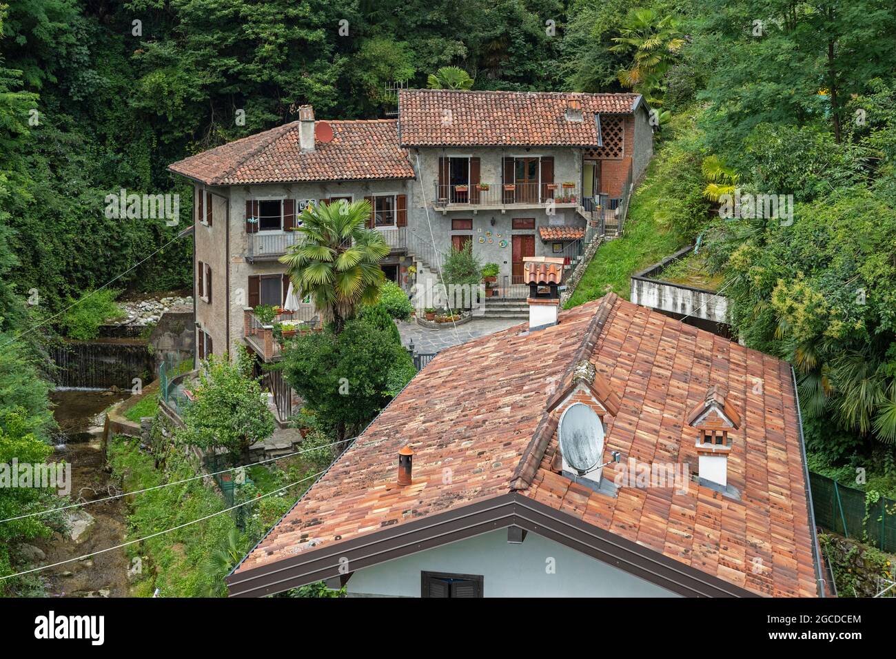 houses at the mountainside, Mount Sasso del Ferro, Laveno, Lake Maggiore, Lombardy, Italy Stock Photo