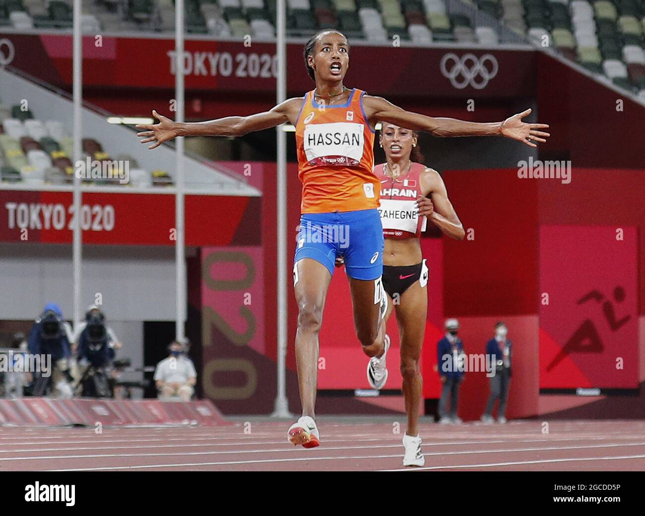 Sifan Hassan of the Netherlands and Kalkidan Gezahegne of Bahrain cross the finish line in the Women's 10,000 meter final at Olympic Stadium during the 2020 Summer Olympics in Tokyo, Japan on Saturday, August 7, 2021. Sifan Hassan of the Netherlands took gold with a time of 29:55.32, Kalkidan Gezahegne of Bahrain took silver with a time of 29:56.18 and Letesenbet Gidey of Ethiopia took bronze with a time of 30:01.72.  Photo by Bob Strong/UPI Stock Photo