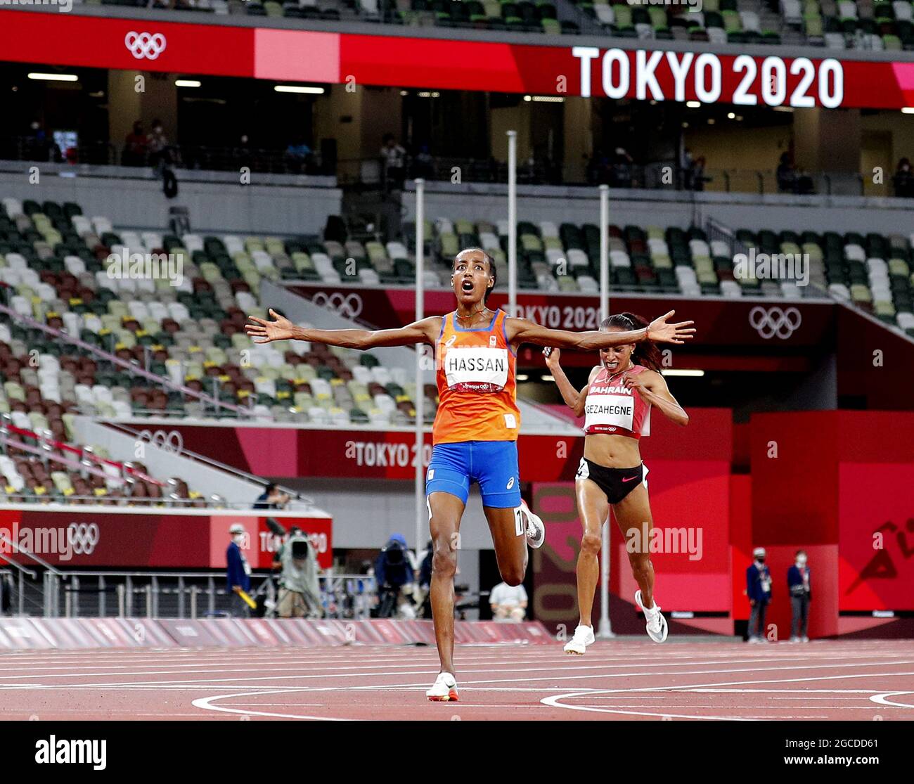 Sifan Hassan of the Netherlands and Kalkidan Gezahegne of Bahrain cross the finish line in the Women's 10,000 meter final at Olympic Stadium during the 2020 Summer Olympics in Tokyo, Japan on Saturday, August 7, 2021. Sifan Hassan of the Netherlands took gold with a time of 29:55.32, Kalkidan Gezahegne of Bahrain took silver with a time of 29:56.18 and Letesenbet Gidey of Ethiopia took bronze with a time of 30:01.72.  Photo by Bob Strong/UPI Stock Photo
