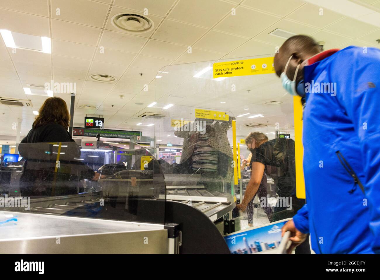 Dublin Airport departures security, Terminal One, Ireland. Masks