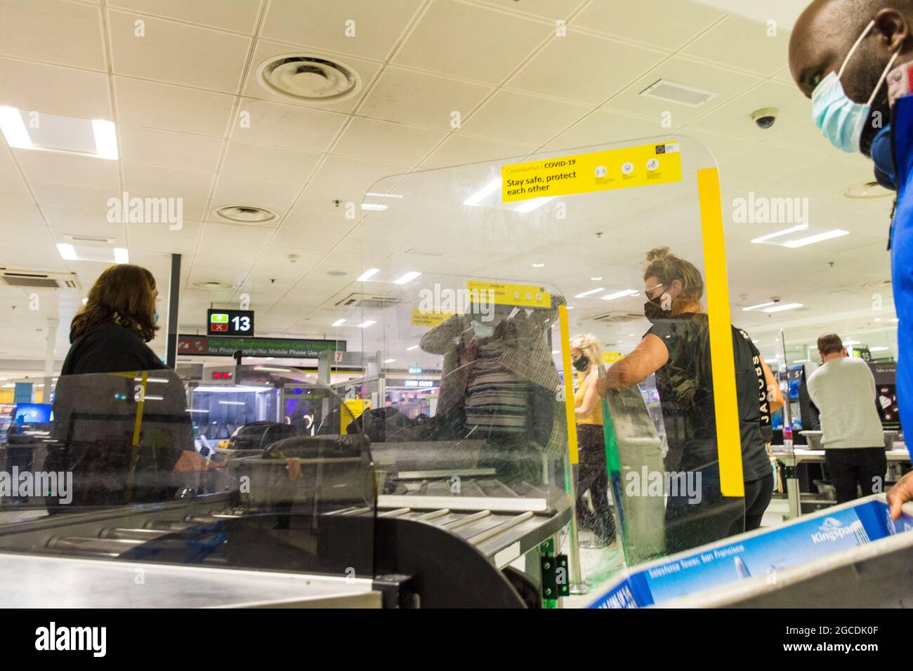 Dublin Airport departures security, Terminal One, Ireland. Masks