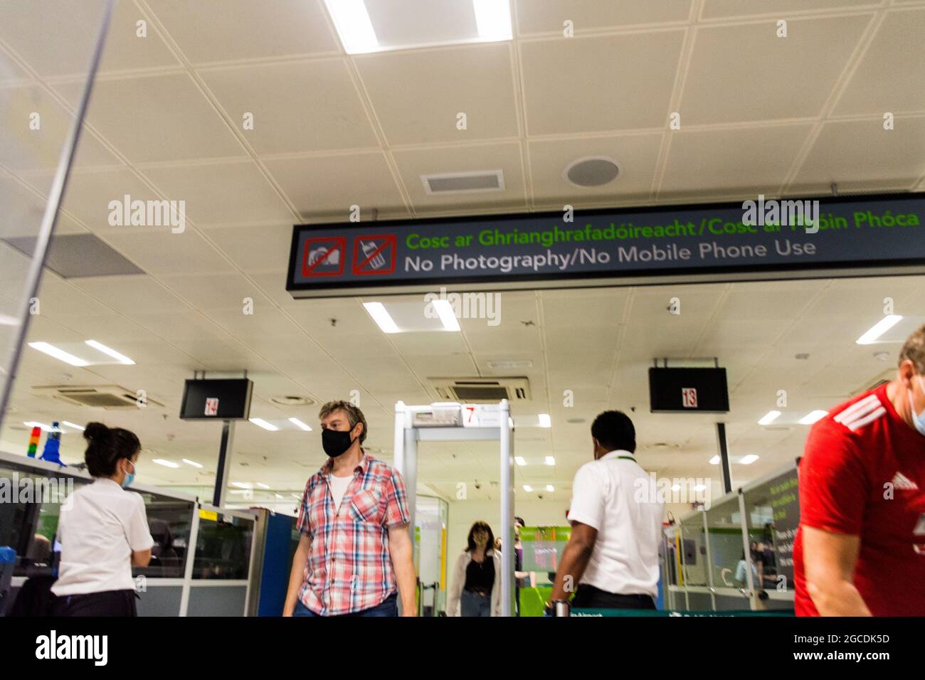 Dublin Airport departures security, Terminal One, Ireland. Masks