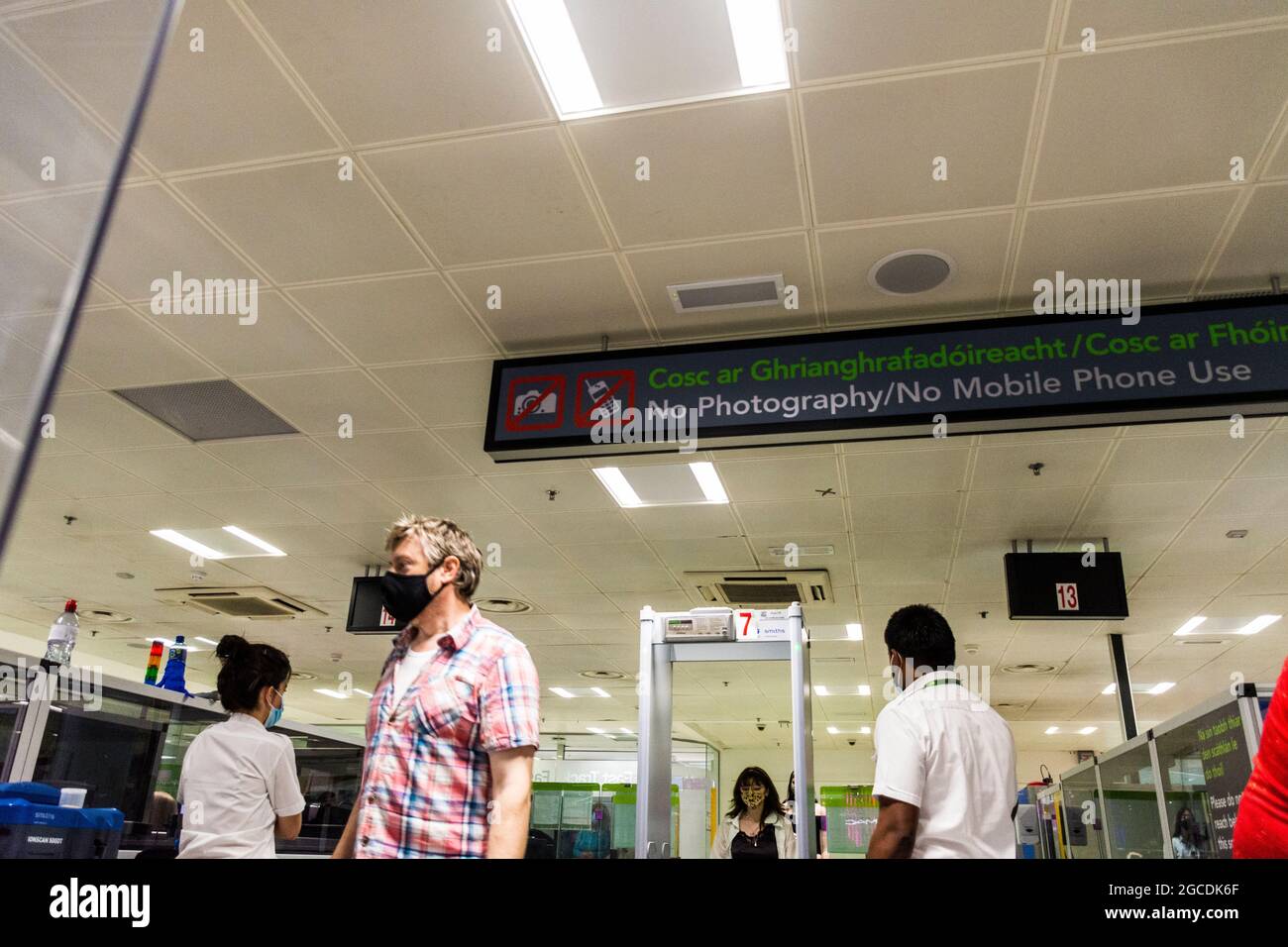 Dublin Airport departures security, Terminal One, Ireland. Masks