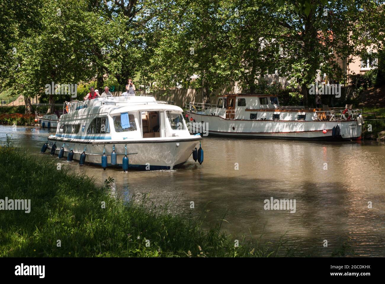 Rental boats for tourists on the Canal du Midi near Ventenac-en-Minervois Stock Photo