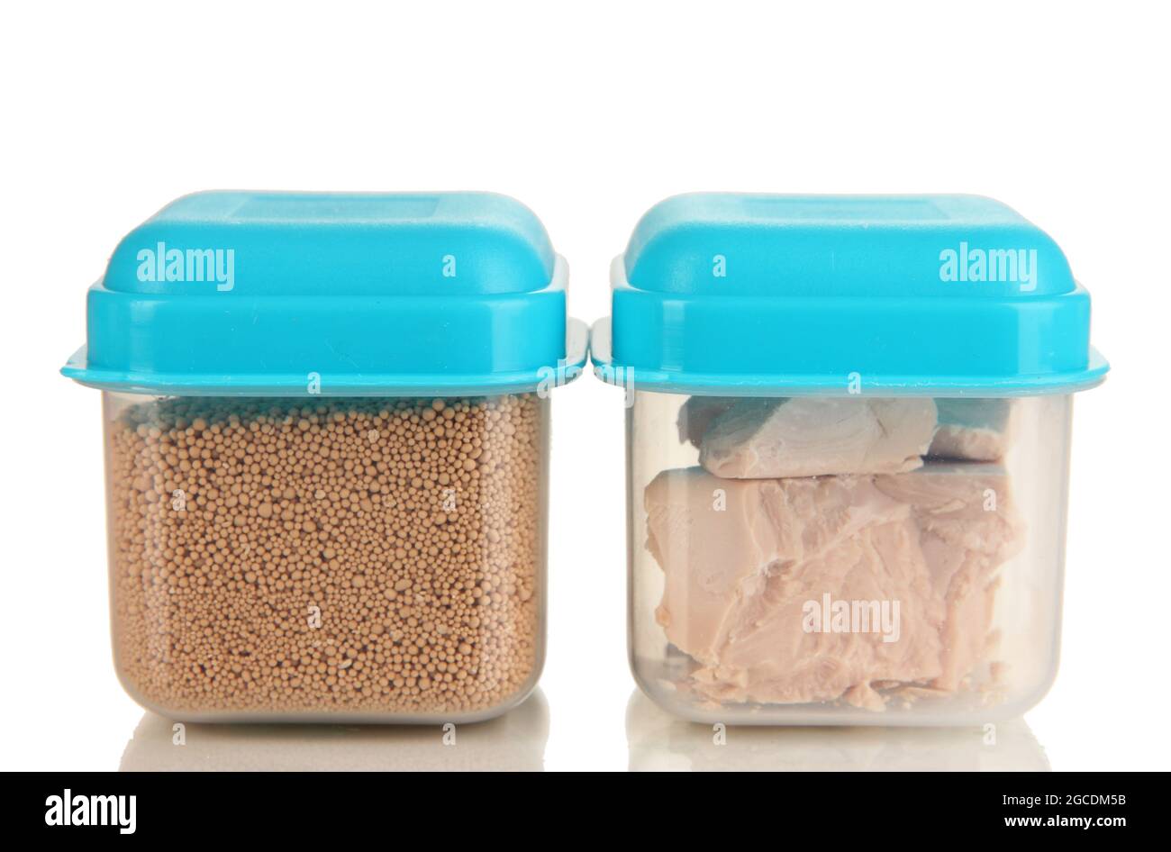 Dry yeast in containers isolated on white Stock Photo Alamy