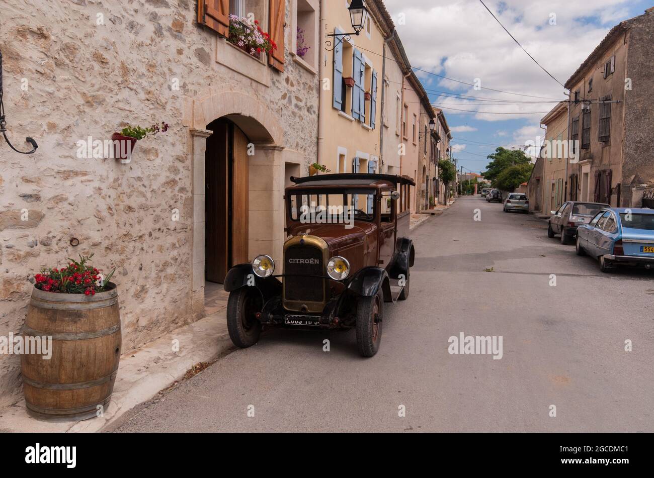 A Citroen classic car parked in the village Le Somail next to the Canal du Midi in Southern France Stock Photo
