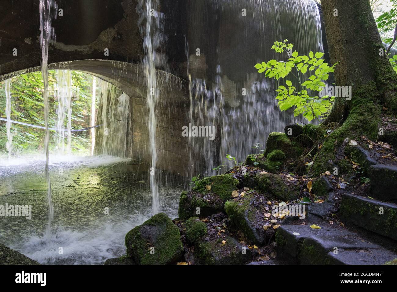 flowing water and hydropower in a remote idyllic location in nature Stock Photo
