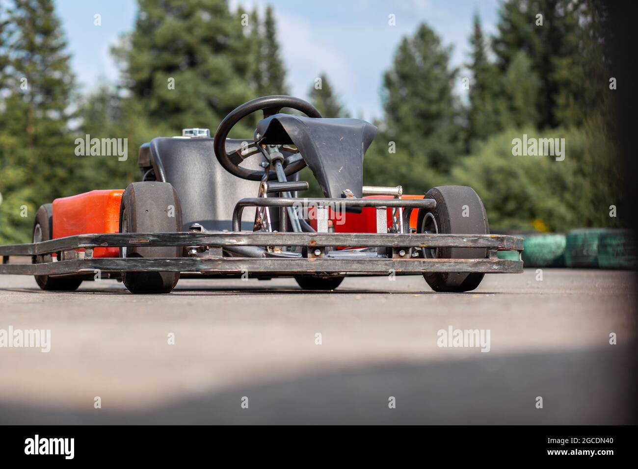 A go-karting car is standing on the highway and waiting for the driver. Go-karting cars for children and adults. Stock Photo