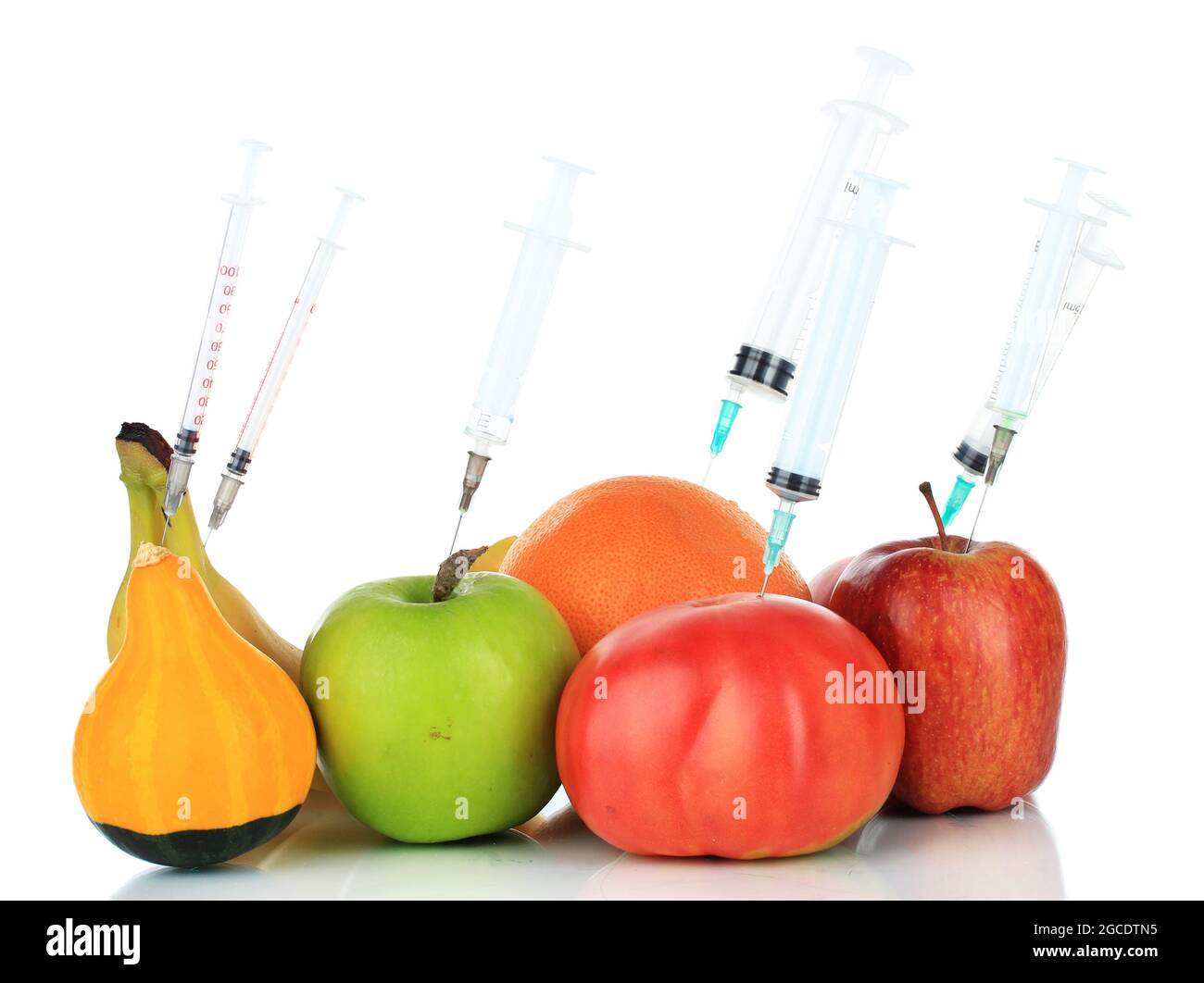 Injection into fruit and vegetables isolated on white Stock Photo - Alamy