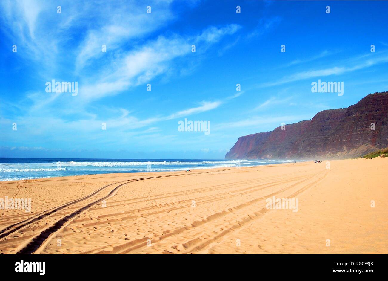 Tire tracks, in the sandy beach of Polihale State Park on Kauai, Hawaii