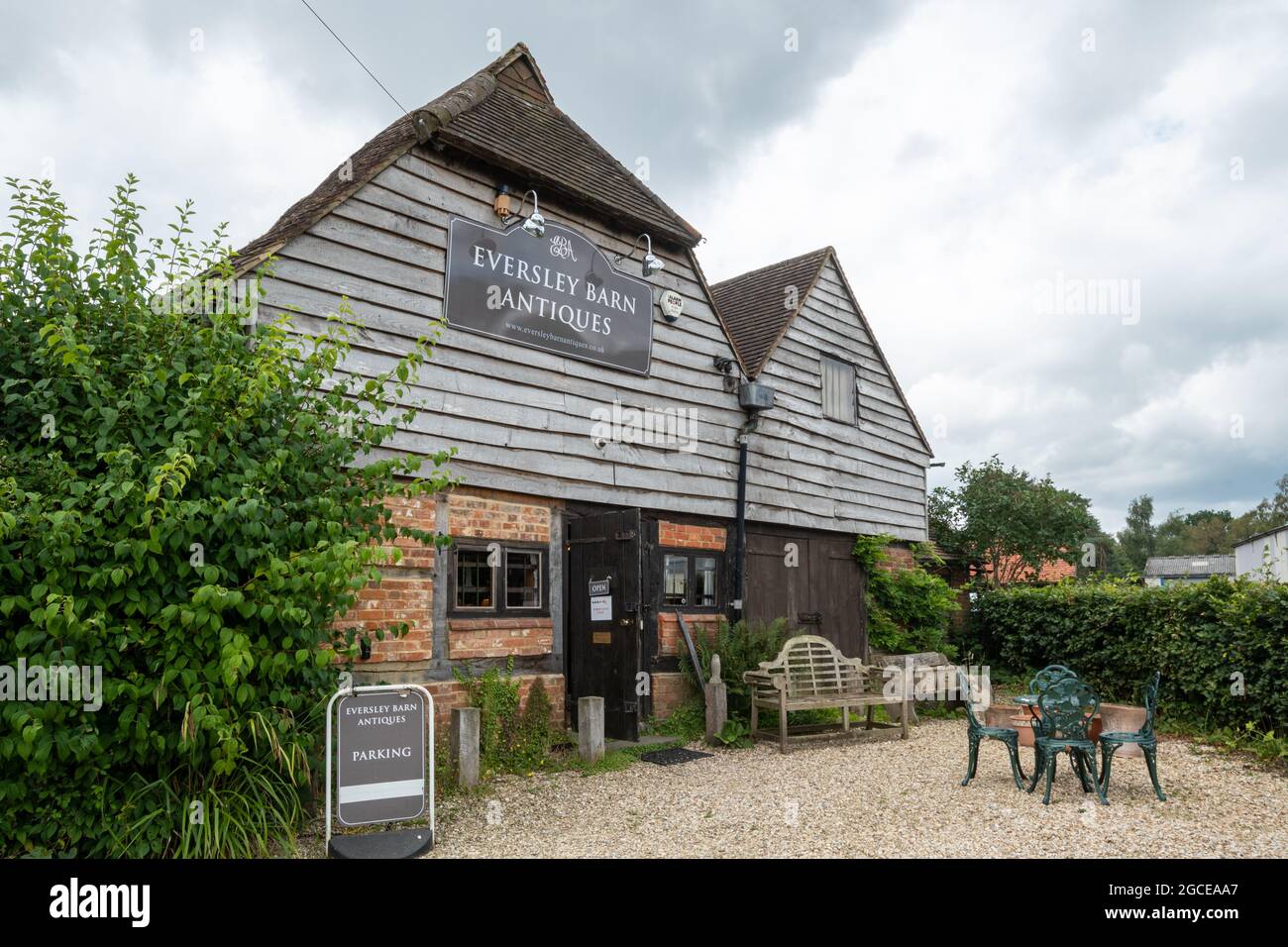 Eversley Barn Antiques, an antique shop located in a 16th century barn in the Hampshire village of Eversley, England, UK Stock Photo