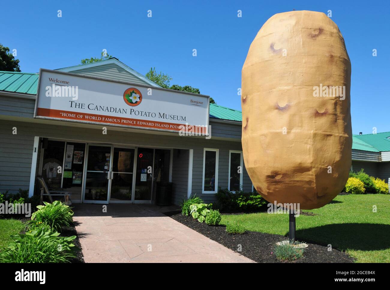 A giant fiberglass potato stands at the entrance to the Canadian Potato Museum, a tourist attraction in O'Leary, Prince Edward Island. Stock Photo