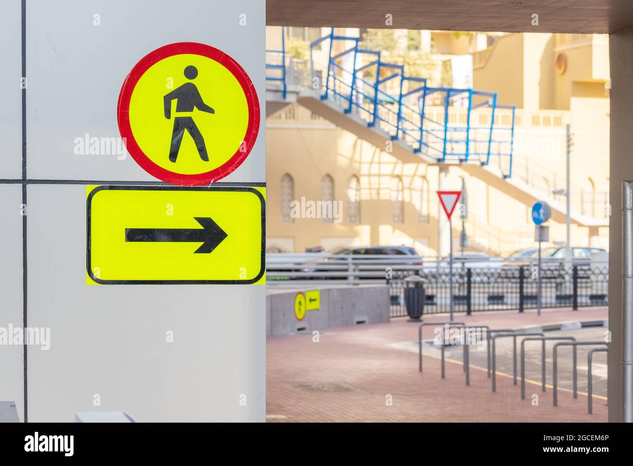 the pedestrian path sign on the street indicates the direction for safe walking in the city Stock Photo