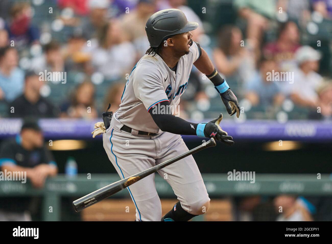 Denver, USA. August 7 2021: Miami centerfielder Lewis Brinson (25) hits a  double during the game with the Colorado Rockies and Miami Marlins held at  Coors Field in Denver Co. David Seelig/Cal