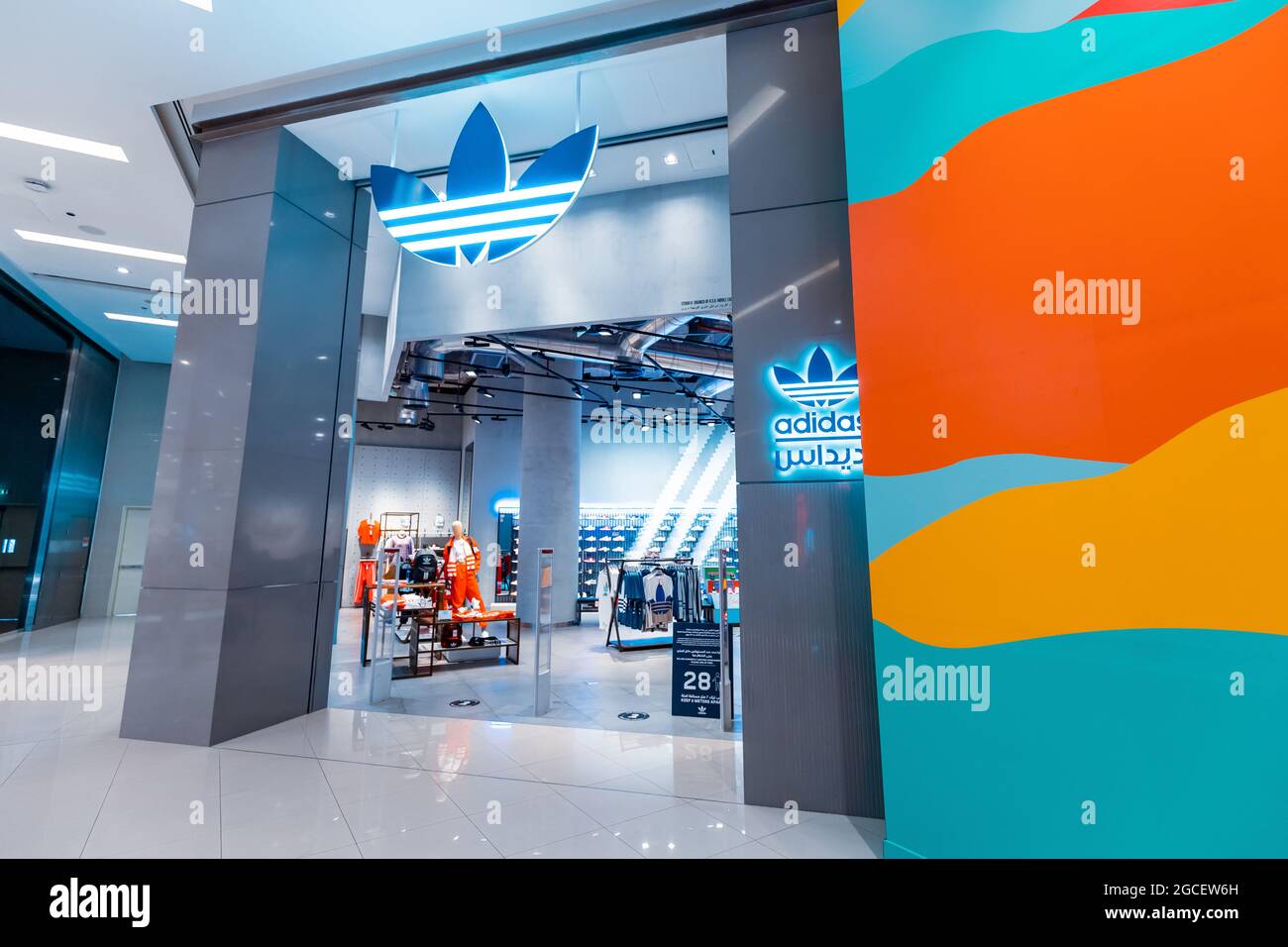 23 February 2021, Dubai, UAE: Adidas sport and fashion store department in  Dubai Marina Mall Stock Photo - Alamy