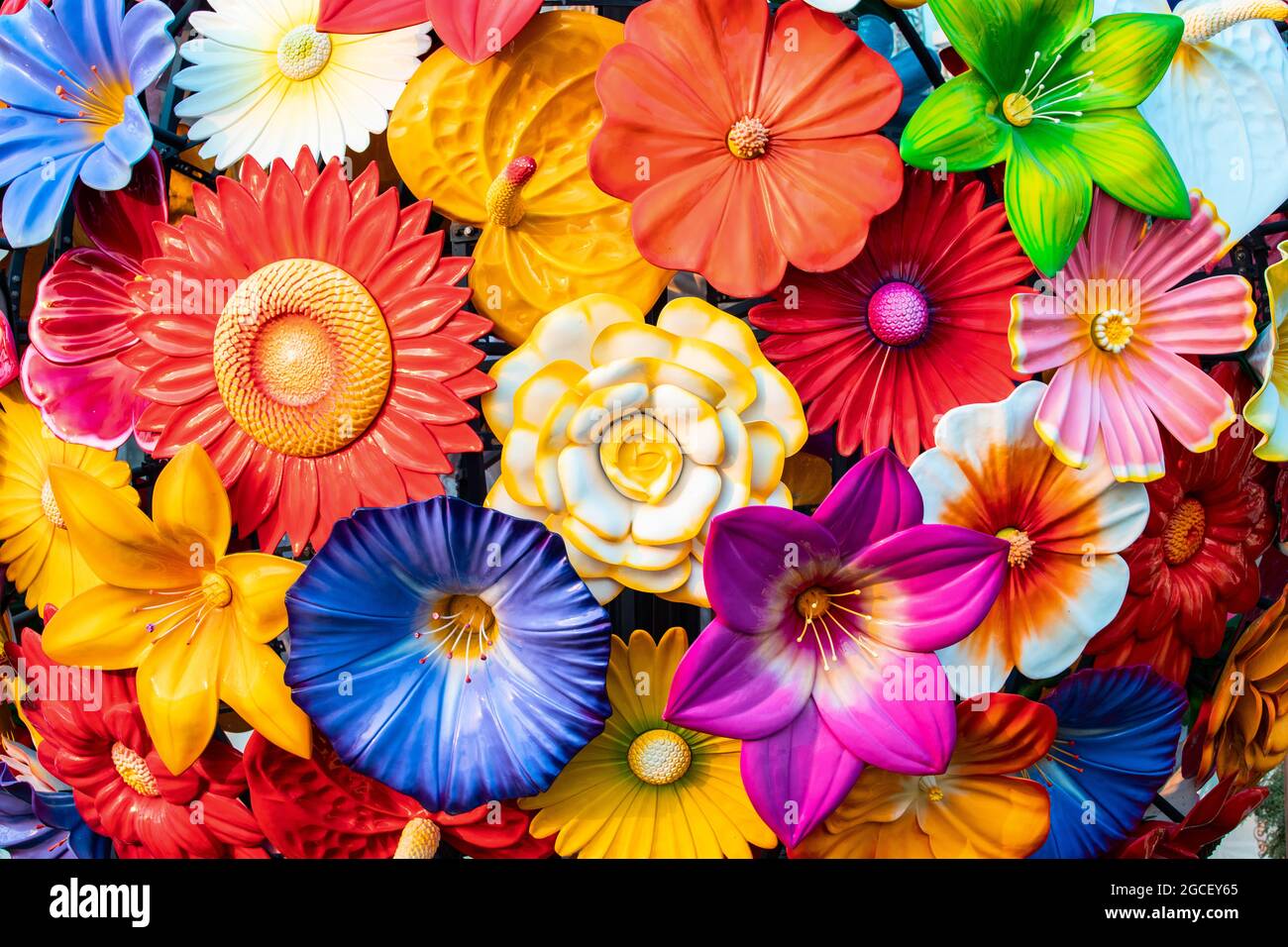 Artificial flowers as beautiful scenery background on city streets Stock  Photo - Alamy
