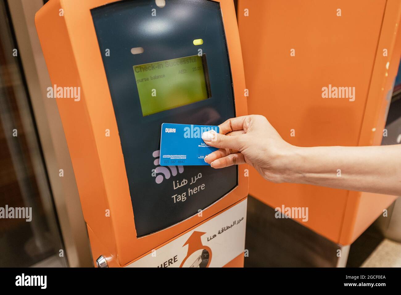 25 February 2021, Dubai, UAE: The passenger applies a contactless smart  transport card RTA to pay for travel on the tram or metro in Dubai Stock  Photo - Alamy