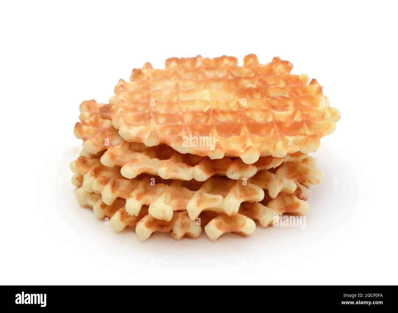 Stack of round homemade waffles isolated on white. Stock Photo