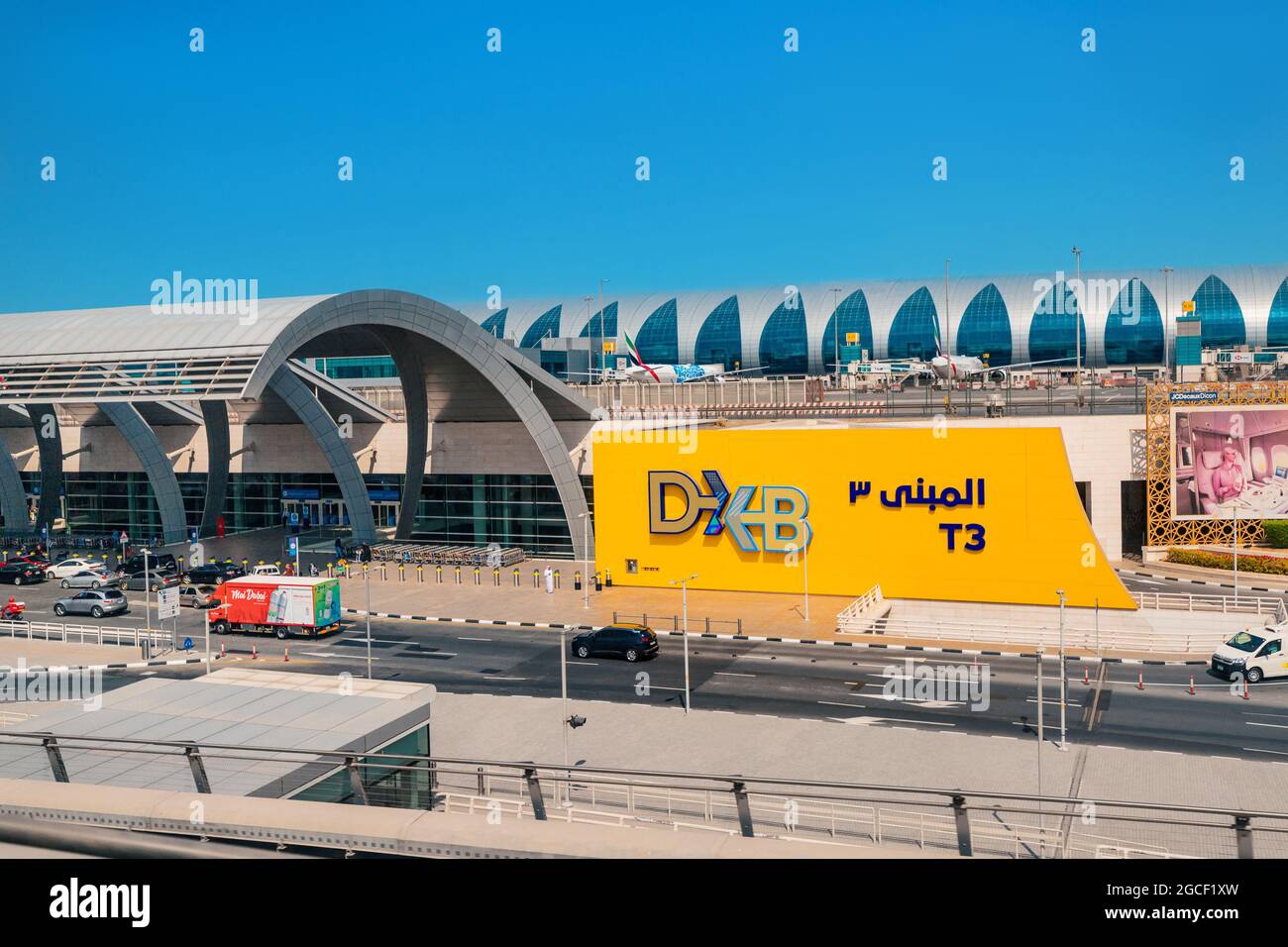 24 February 2021, Dubai, UAE: Entrance to the terminal of modern Dubai DXB Airport. Airline hub concept Stock Photo