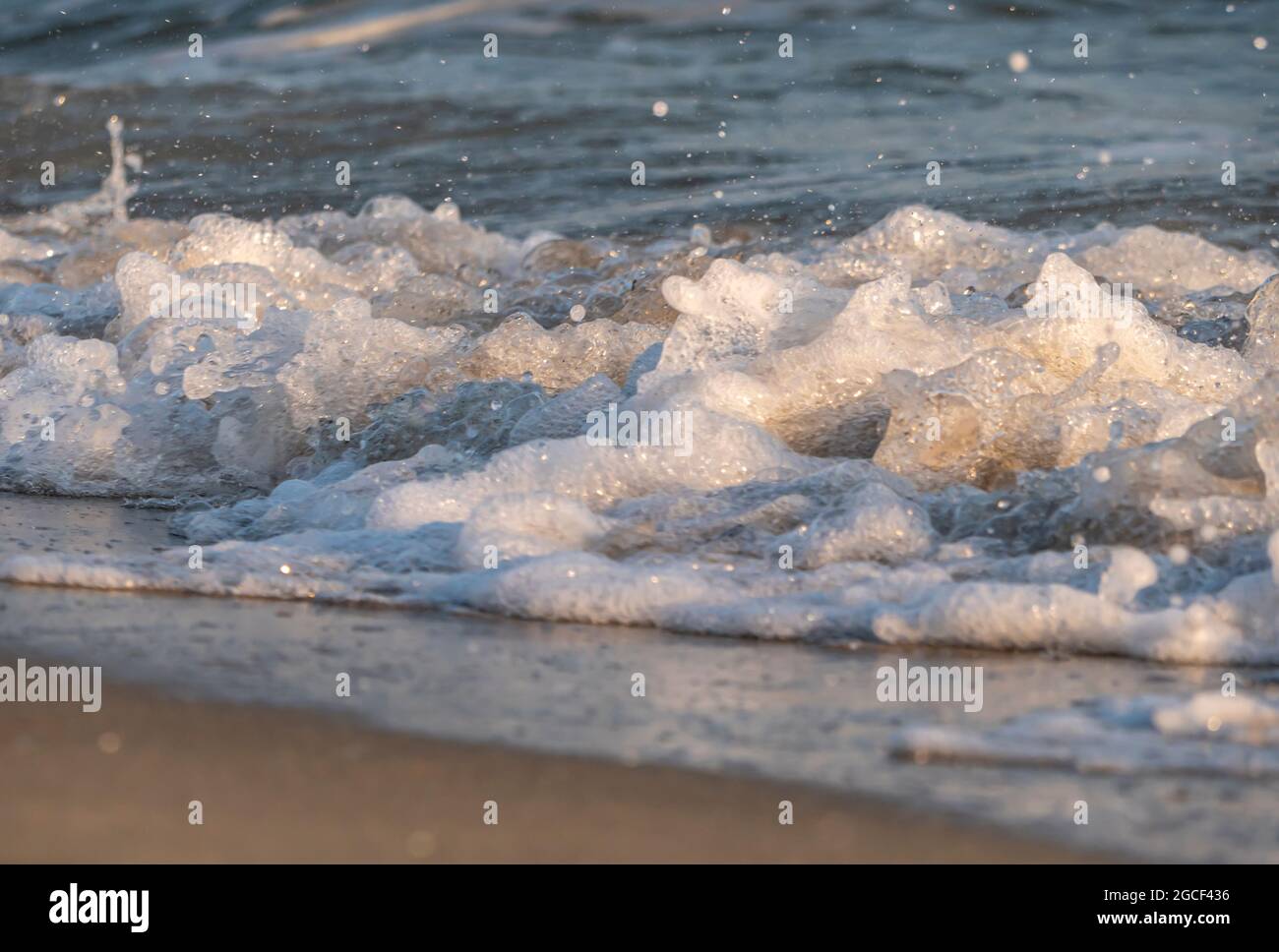 wave splash sea beach macro, close up Stock Photo - Alamy