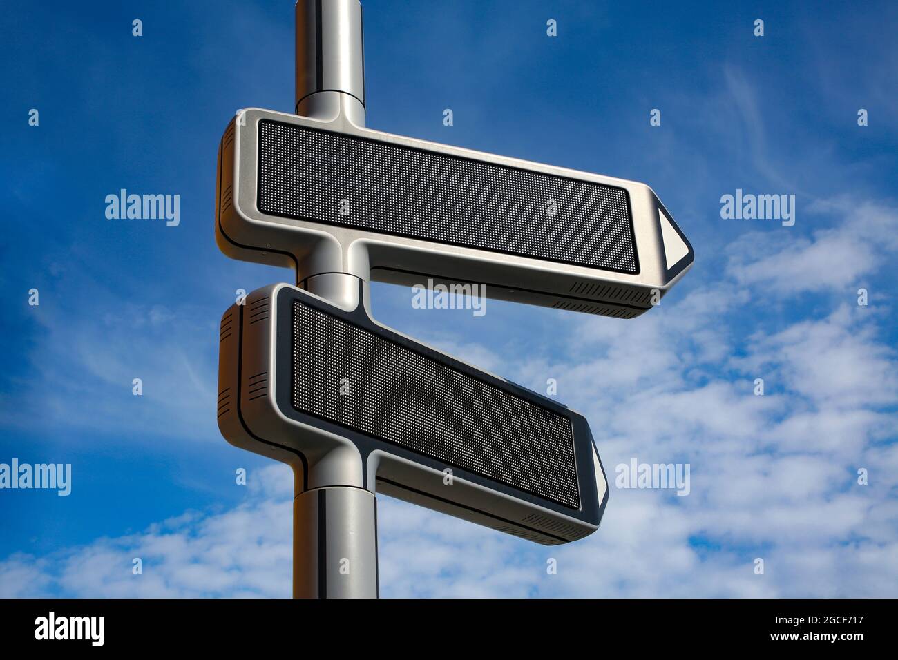 Modern digital sign post. Moves to direction to point and displays information as text and images, Stavanger, Norway. Stock Photo