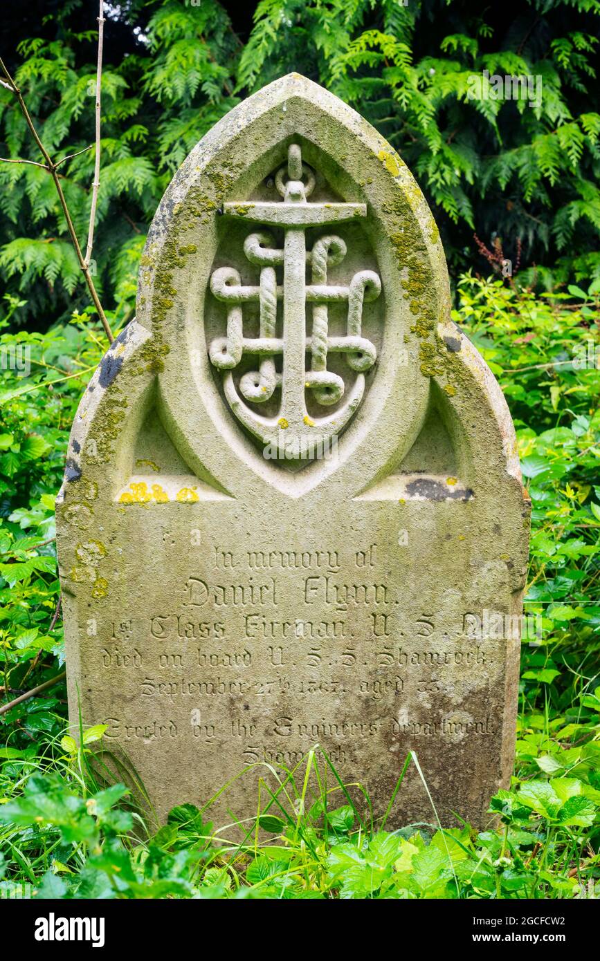 A headstone erected in 1867 in memory of Daniel Flynn, a 1st Class Fireman of the United States Navy ship USS Shamrock in Southampton Old Cemetery Stock Photo